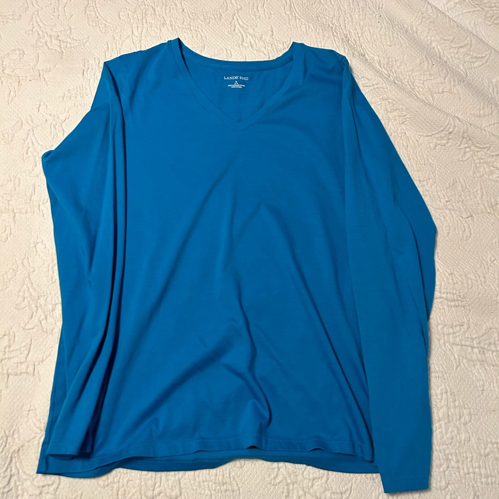 Lands’ End size S.  Long sleeve top in teal.